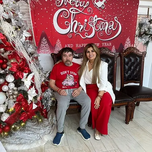 24/7 care staff assisting a resident in our 6-bed boutique facility